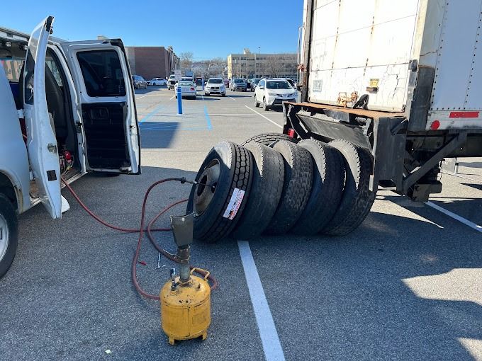 Truck Tire Installation 2 Truck Tire Installation in Bronx, NY. Tires being filled with air.